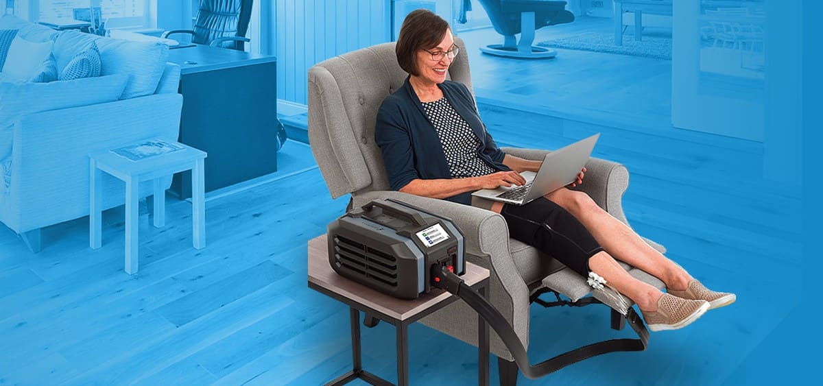 Patient using cold and hot compression therapy at home